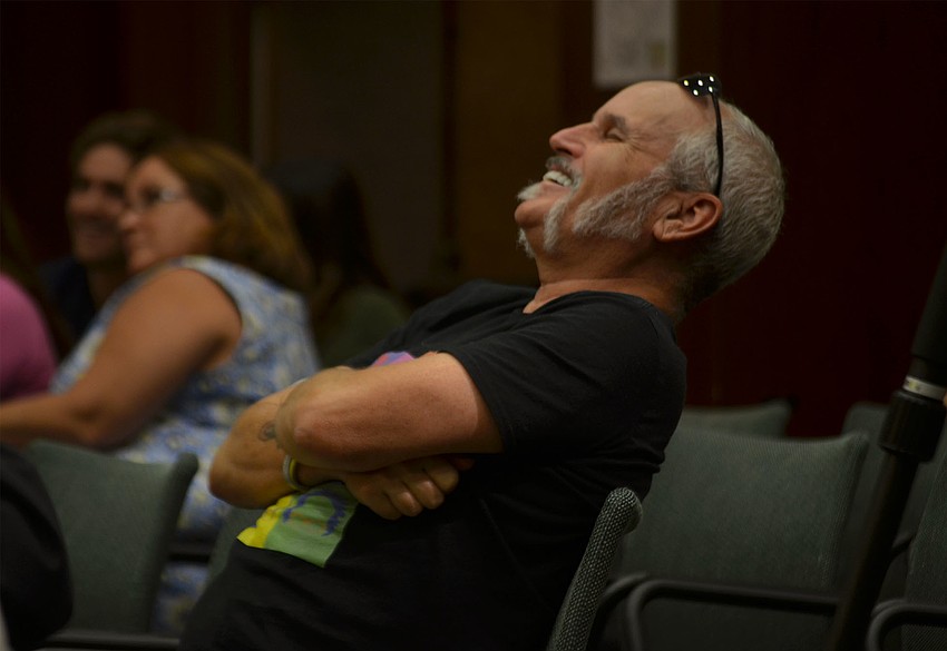 Luigi Costello laughs while  Republican candidates for the House of Representatives, District 73, Joe Gruters and Steve Vernon, argue about the origins of a mailer advertisement distributed last week. Vernon said he had never seen the mailer before.