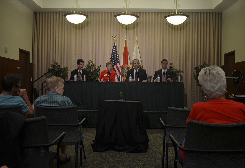 (From left to right) Republican candidates for the State Senate, District 23, Rick Levine, Nora Patterson, Ray Pilon and Greg Steube wait for Publisher of Observer Media Group Inc. Emily Walsh to begin the panel.