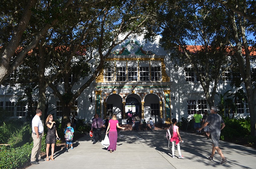Parents dropped off students at the entrance to Bay Haven School of Basics Plus.