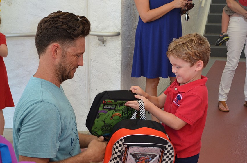 Owen Booth tells his father Willy about his first day of kindergarten.