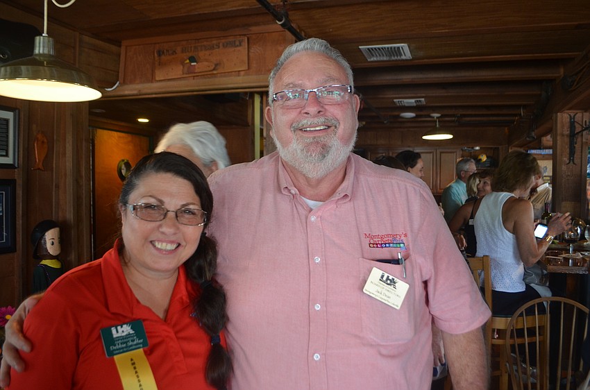Debbie Shaffer of Veterain Air and Jack Dean of Montgomery Carpets Plus
