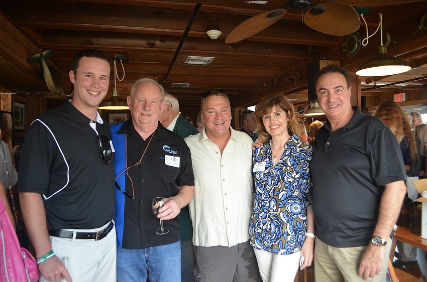Trey Kiser of Out of the Blue Marketing, Ron Fuller of Surf Shack, Allan Zuckerman of Beach Breeze Weddings, Liana Vitorino of Amore and DJ Jorge Rodriguez