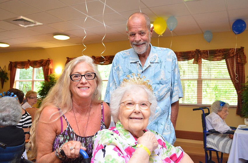Debbie and Bob Laws with 100+ Club newcomer Edith Laws.