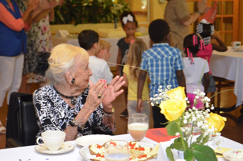 Henrietta Daytz is thrilled to see the children dancing around the room.