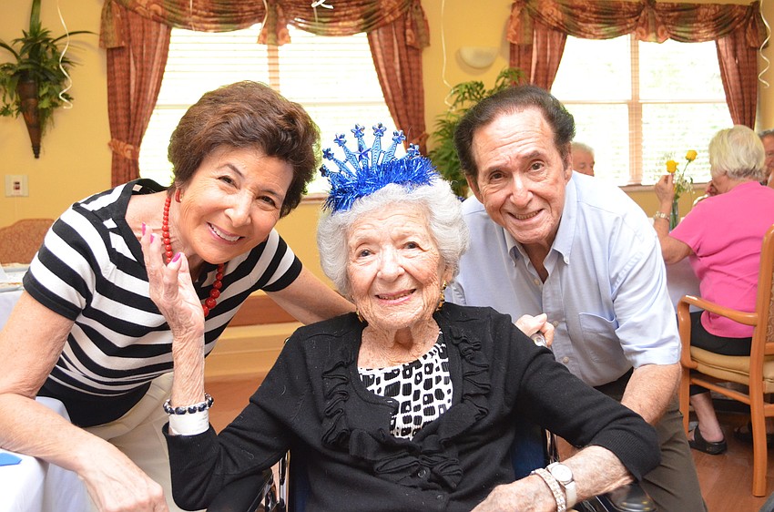 Eleanor Landow with her daughter Jill Ross and son-in-law Armand Ross.