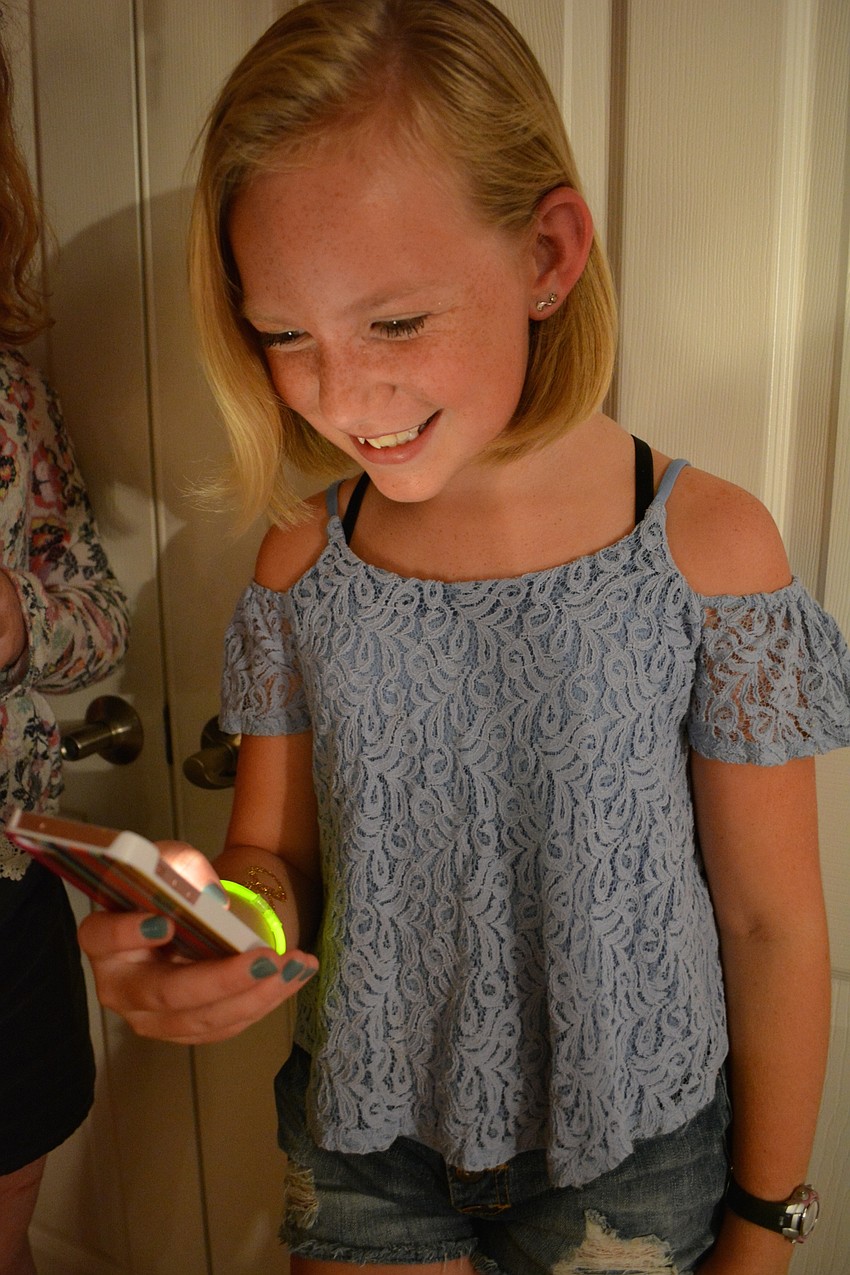 Ava White, 11, takes a selfie just for kicks.