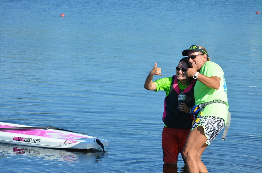 Nicki Facompre and Coach Fleda Carroll pose together before Facompre begins her long race.