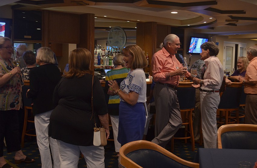 Bird Key Yacht Club members enjoyed cocktails before dinner at the club's Here All Year party.