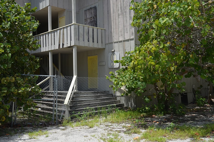 A Colony Resort condo is fenced off on the grounds on Longboat Key.