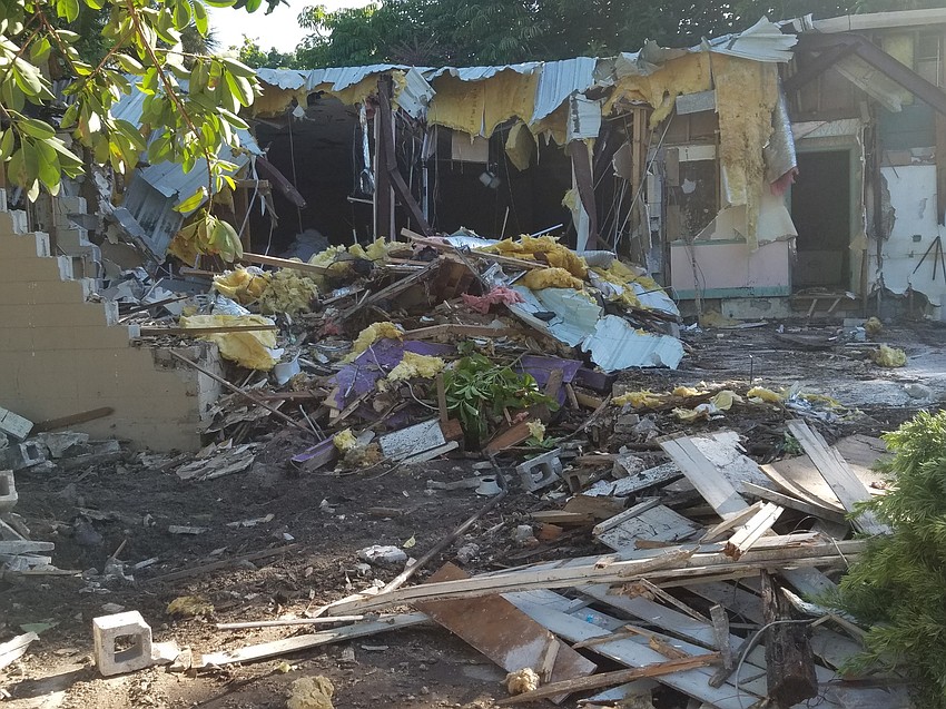 The grounds are littered with the remains of five former service building at Colony Resort. The demolition site has since been cleared.