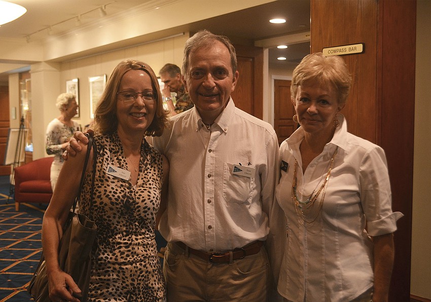 (From left to right) Sue Ghezzi, Tom Ghezzi and Commodore Lynn Smith