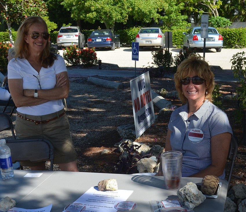 Michelle Morris, left, and Terry Koloezieski helped inform voters Tuesday at Precinct 309 in Manatee County on Longboat Key.