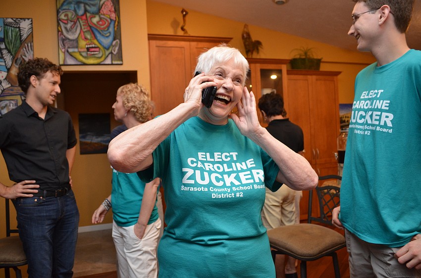 Sarasota County School Board member Caroline Zucker gets the call that with one precinct left to report she has a strong enough lead to declare a victory.