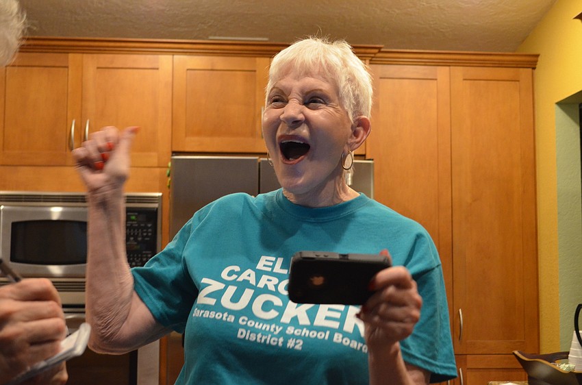 With the initial results in Caroline Zucker celebrates an early lead on opponent Teresa Mast.