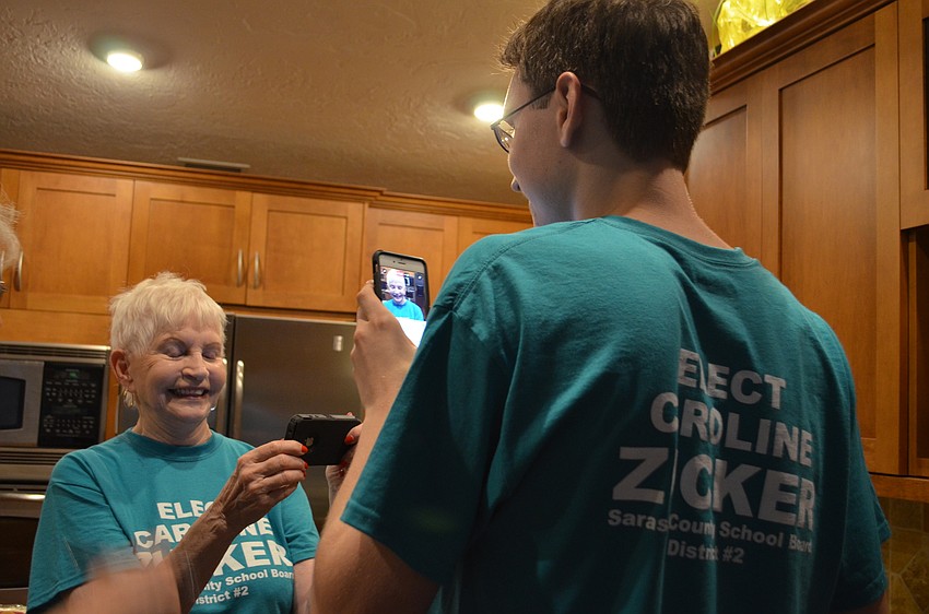 Caroline Zucker and grandson Owen Leonard document the watch party live on Facebook.