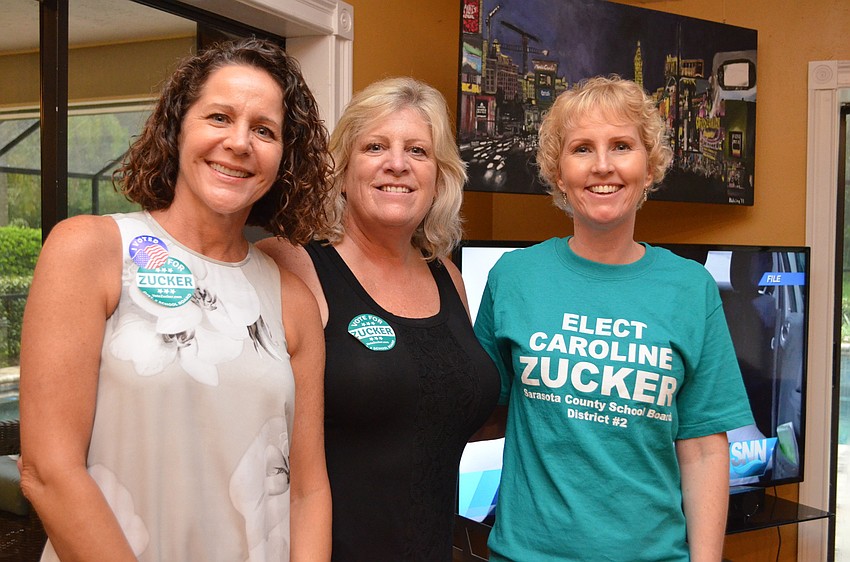 Caroline Zucker supporters Cathi Bell, Denise Chu and Zucker's daughter Liza Leonard.