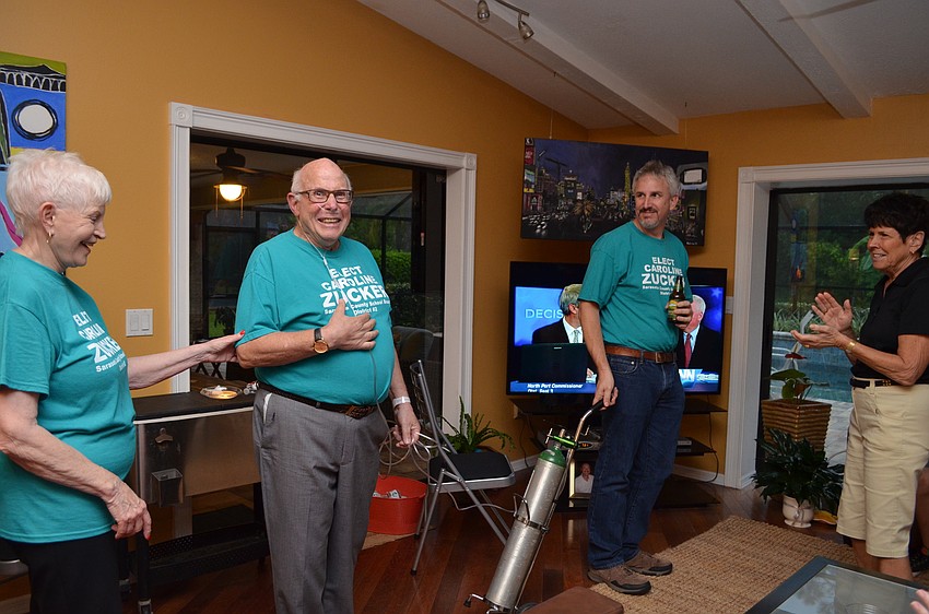 Friends and family gathered at a neighbors house to show support for Sarasota County School Board member and candidate Caroline Zucker.