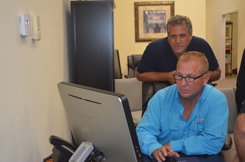 Frank DiCicco and Rich Carrier watch the votes come in.