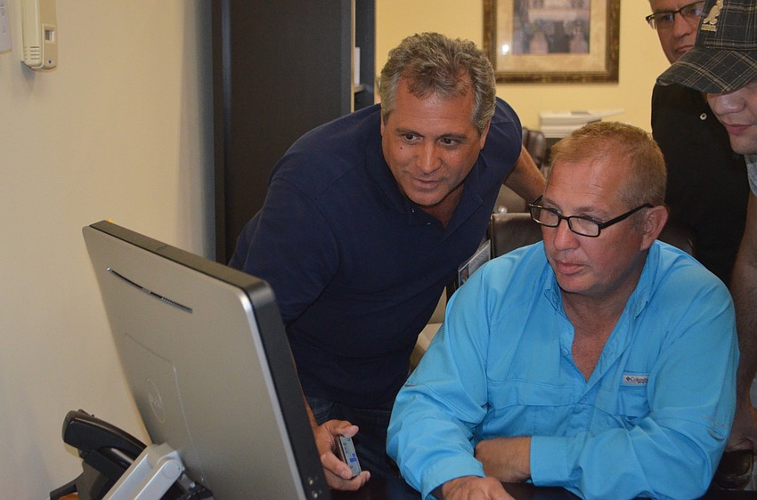 Frank DiCicco and Rich Carrier watch the votes come in.