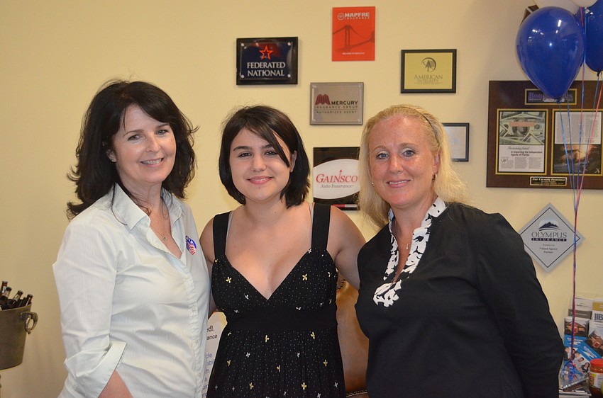 Cathy Antunes and Logan and Danyel Libertore at DiCicco's watch party.