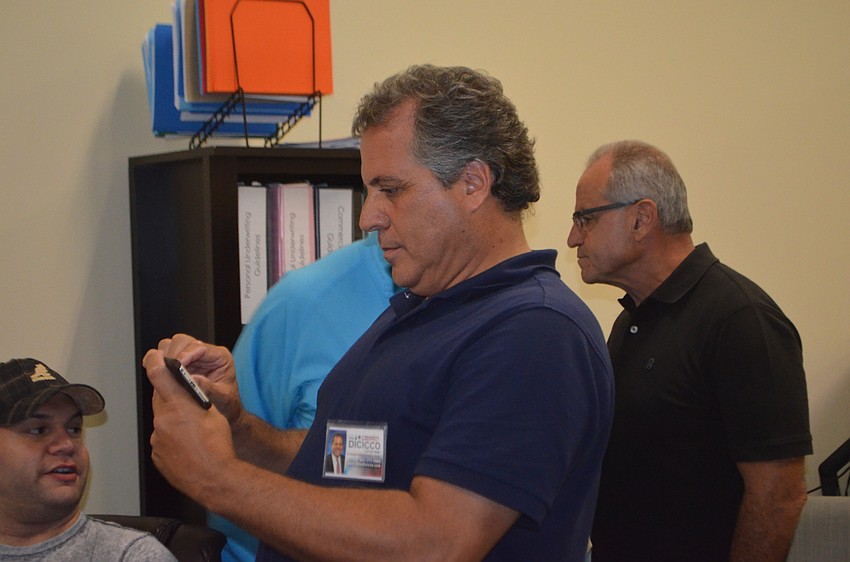 Frank DiCicco waits for the results to come through.