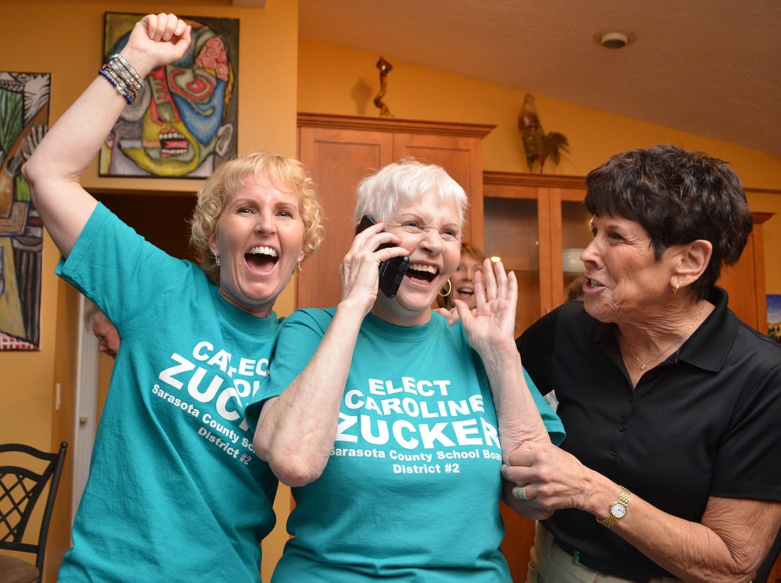 Sarasota County School Board member Caroline Zucker celebrates keeping her seat with daughter Liza Leonard, left, and Margie Cohn.