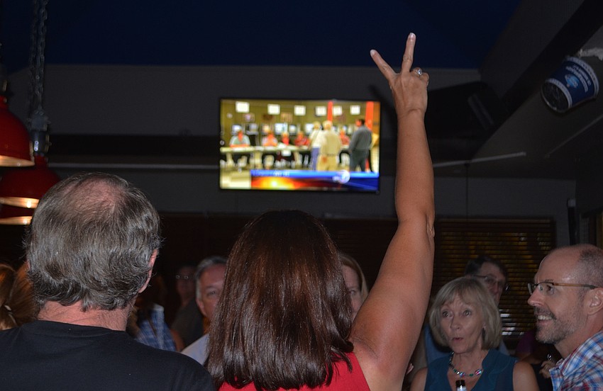 An excited Teresa Mast reported that she had won 2,000 votes as precincts began to report the results of the District 2 School Board seat. Mast hosted supporters at the Geckos Grill on Cattleman.