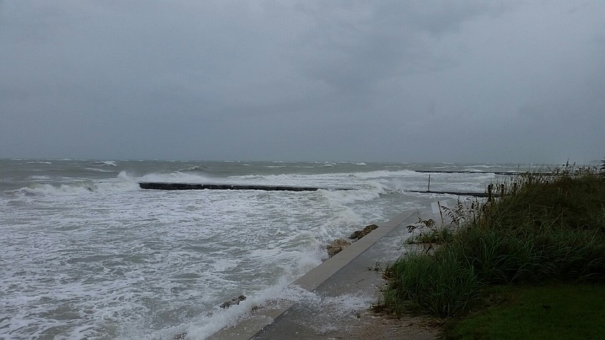 Surf driven by winds form Hurricane Hermine pounds the groin Thursday on North Longboat Key.