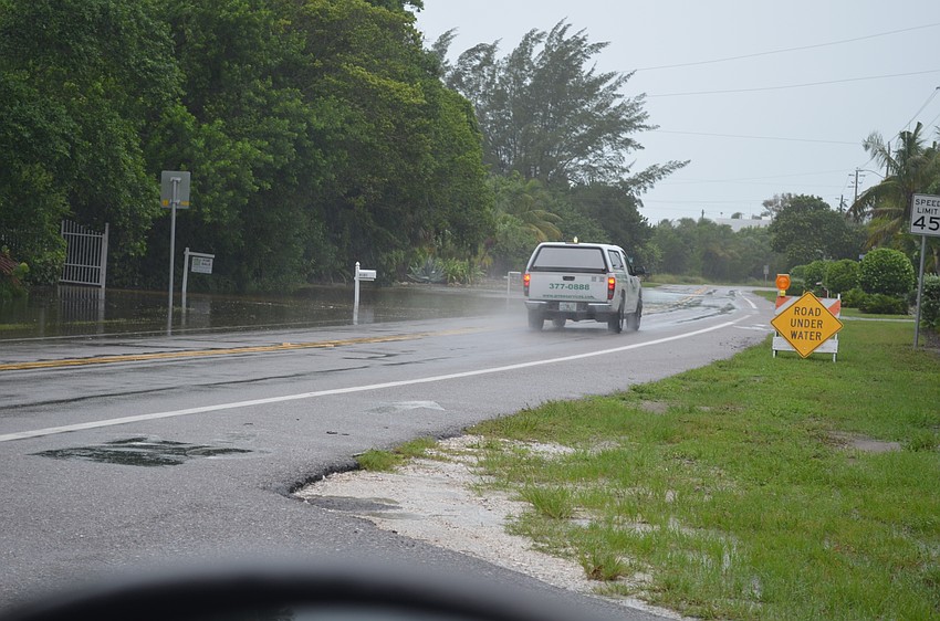 Gulf of Mexico Drive flooded just past the 6800 block Thursday but did not become impassable.