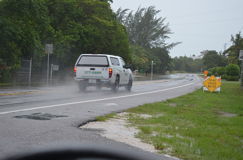 Gulf of Mexico Drive flooded just past the 6800 block Thursday but did not become impassable.