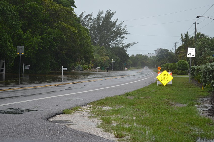 Road flooding continues to be an issue Friday on Longboat Key.