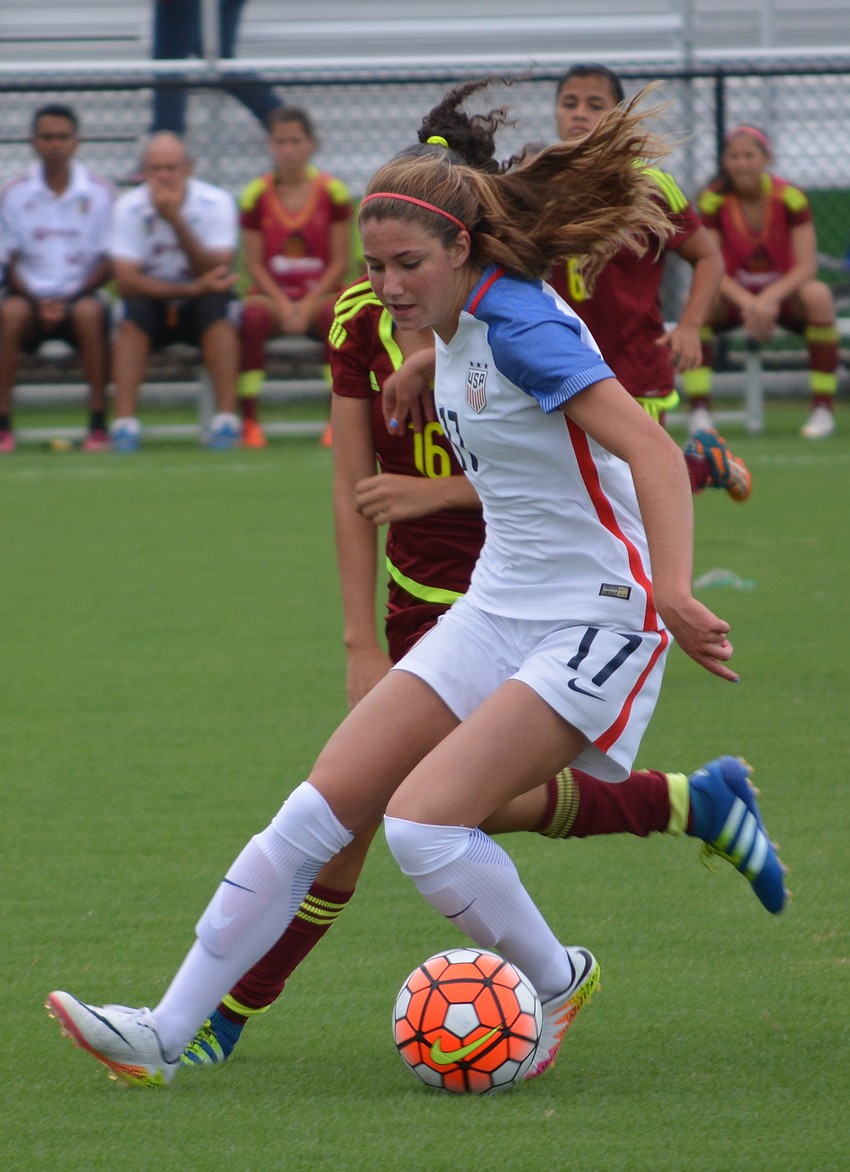 Kate Weisner of the U.S. team maneuvers down the field.
