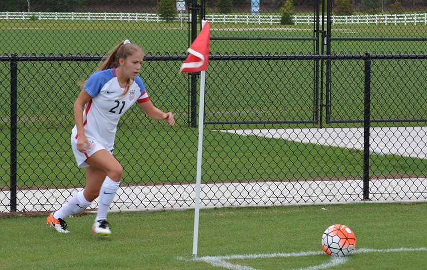 Ashley Sanchez of the United States delivers a corner kick.