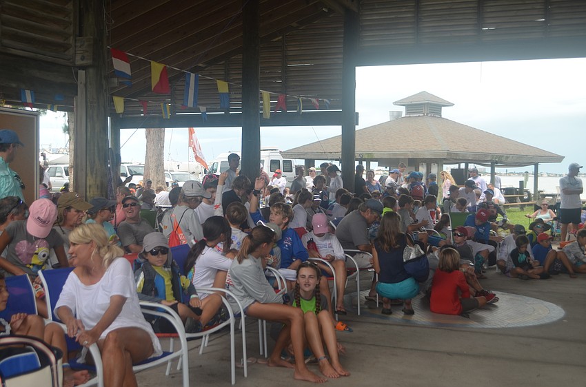 Sailors, coaches and parents gathered before regatta began.