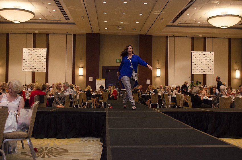 Denise Oyler gives her best runway strut.