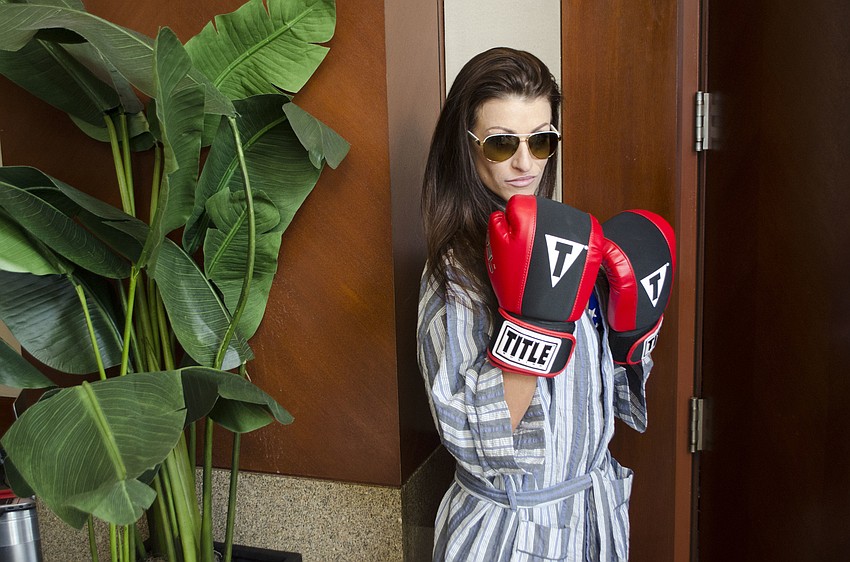 Shayla Twit gets hyped before sporting a wrestling-themed outfit on the runway.