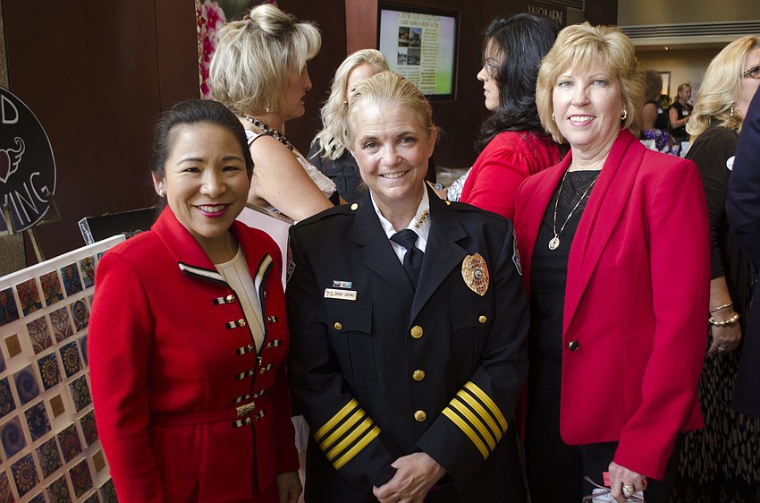 Lee-En Chung, Sarasota Police Department Chief Bernadette DiPino and Kathy Collums.