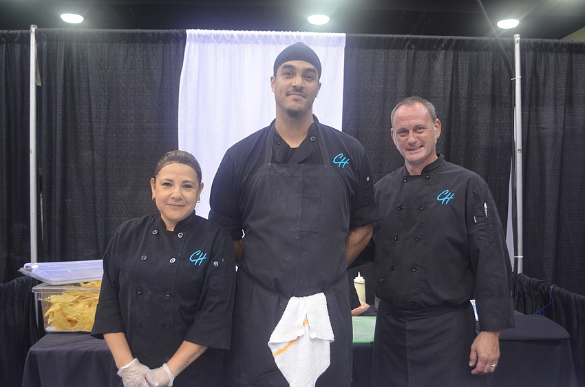 Vironica Bicallo, Jason Russell and Mike Bennett of Chart House Restaurant