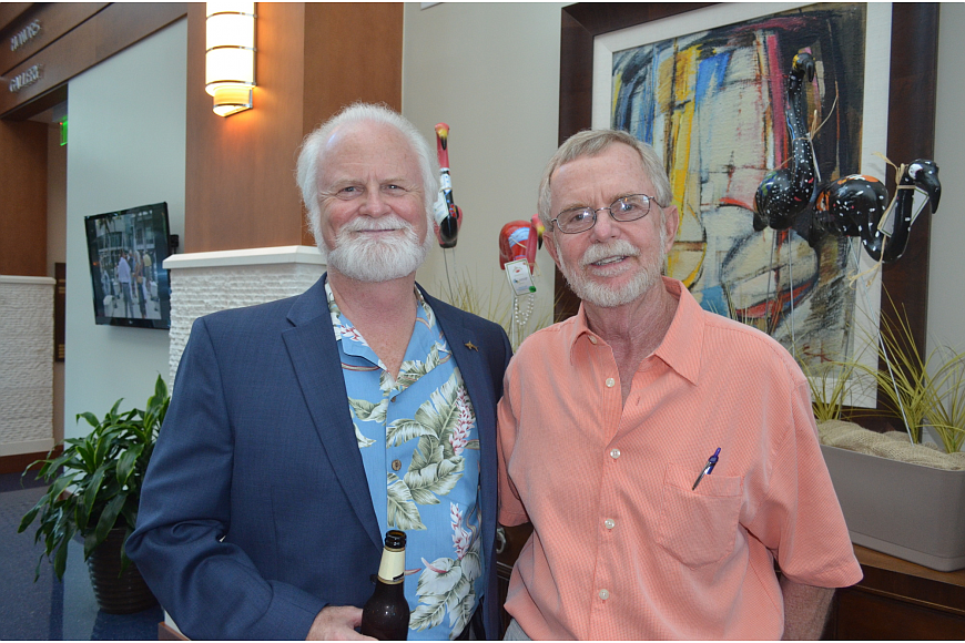 Dr. Michael Crosby, CEO and President of Mote Marine Laboratory and Aquarium, and Sarasota Bay Watch founder Rusty Chinnis at last year's Scallopalooza. Photo by Kristen Herhold