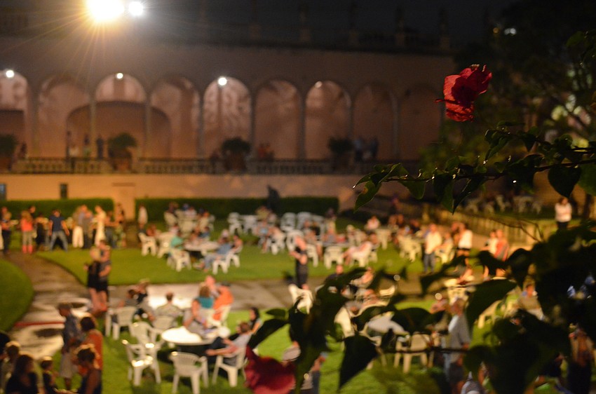 Despite the rain, crowds continued to file into the flower-lined courtyard as the night went on.