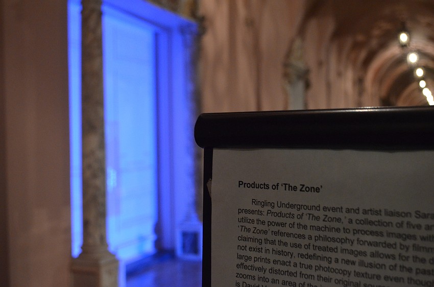 The first of the five works included in Products of ‘The Zone.’ This piece is “Ghost Town,” a silent video projected onto the outside wall of the museum that utilizes color-saturation and sepia treatments.