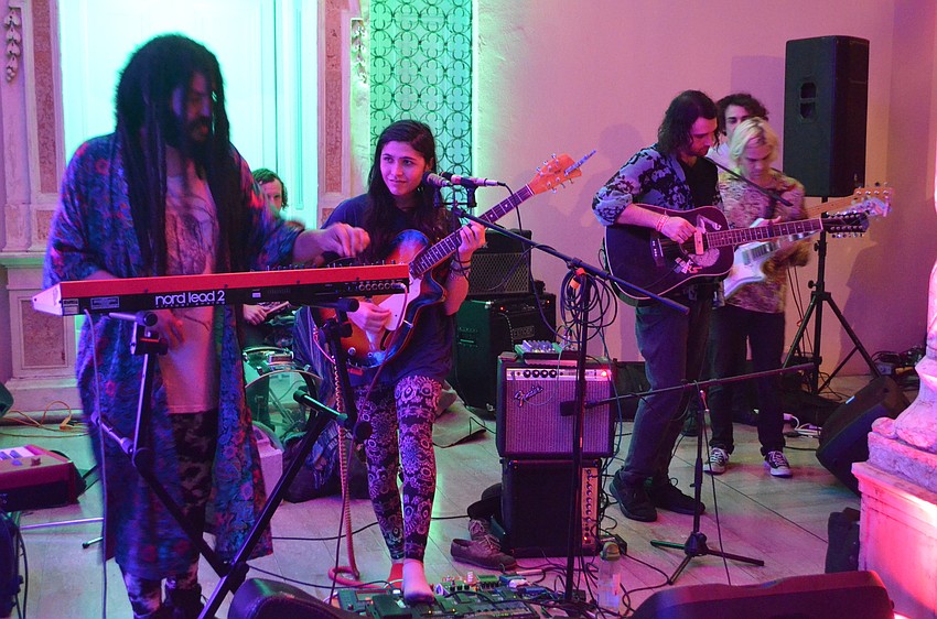 Lead singer Jasmine Deja performs with her band, Soapbox Soliloquy And The Nimbus Initiative.