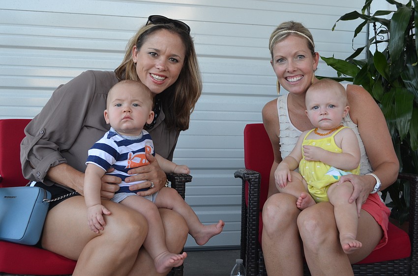 Stacey and Blake Tennant with Trisha and Katie McCarthy.