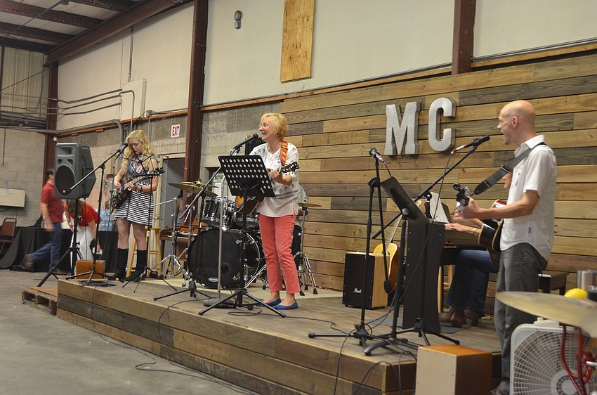 Music Compound teachers Savannah Brady (bass guitar/vocals), Chuck Parr (drums), Sabine Kvenberg (guitar/vocals), Mary Sutton (piano) and Paul Luther (piano) kick off the live performance portion of the celebration.