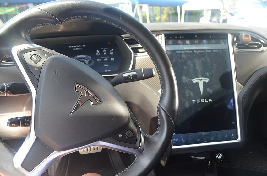 People could sit in different electric vehicles, such as this 2014 Tesla P85D,  during Mote Marine Laboratory and Aquarium’s 5th annual Electrify the Island.