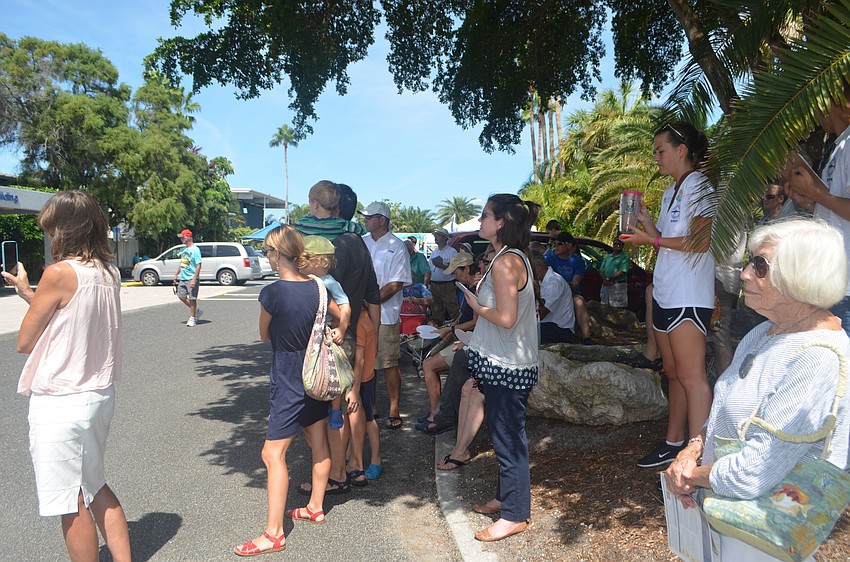 Event attendees listen to various speakers discuss the importance of keeping fumes out of the ecosystem.