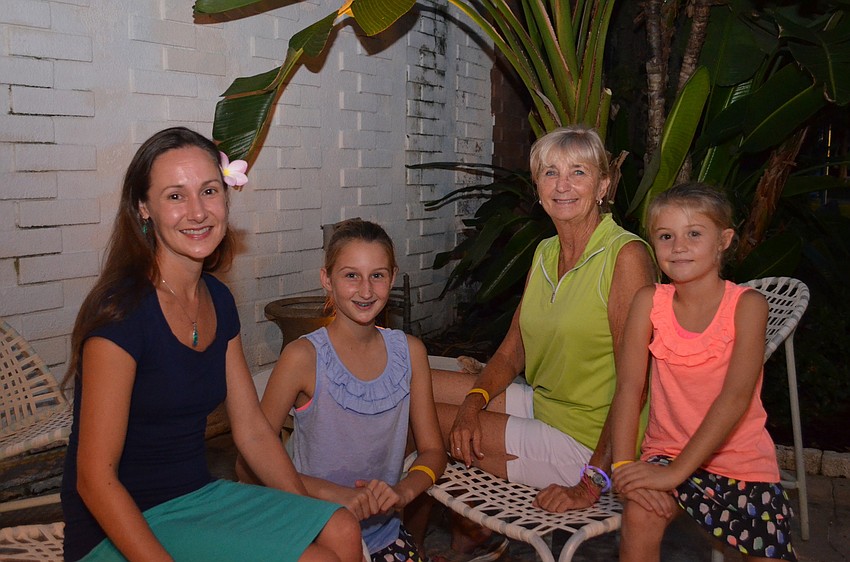 Evan Schulte, Elizabeth Davis with her grandmother Sandee and sister Natalie.