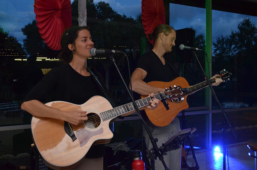 Jen Morrison and Ray Jester perform during the evening.