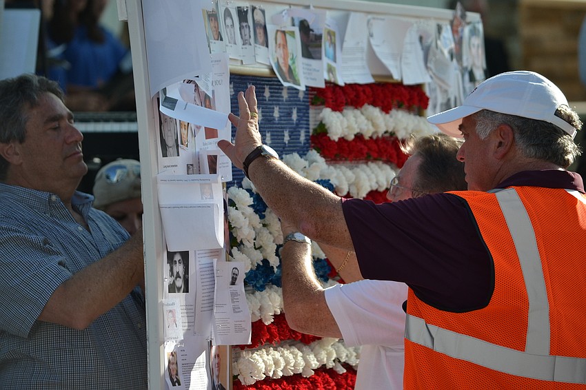 Guests add flowers and photos to represent their 