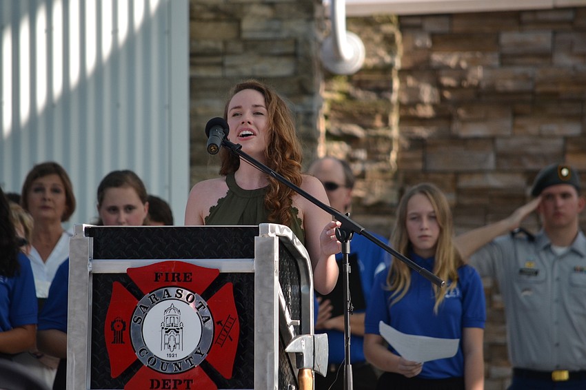 Erika Miller during the performance of the national anthem.